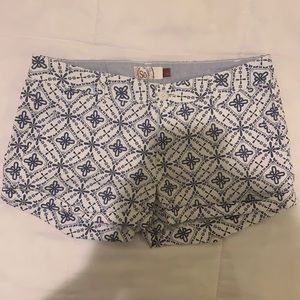 navy and white patterned shorts